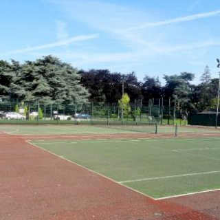 Photo of two tennis courts at Wilton Park on a sunny day